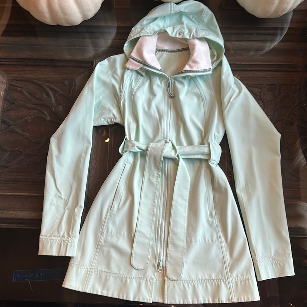 Sea foam lululemon rain-resistant jacket.